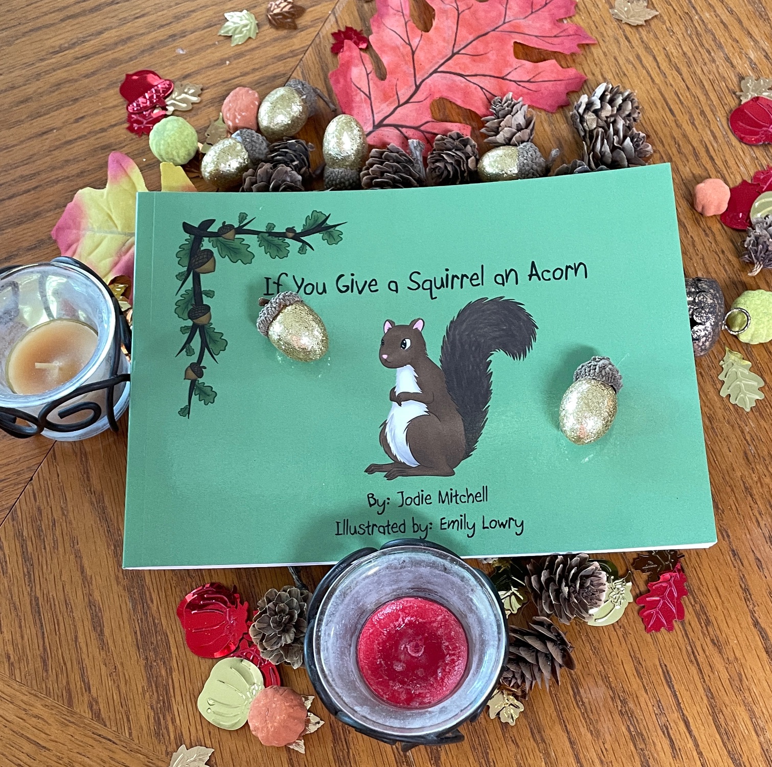 pink rose in gray ceramic vase on white table